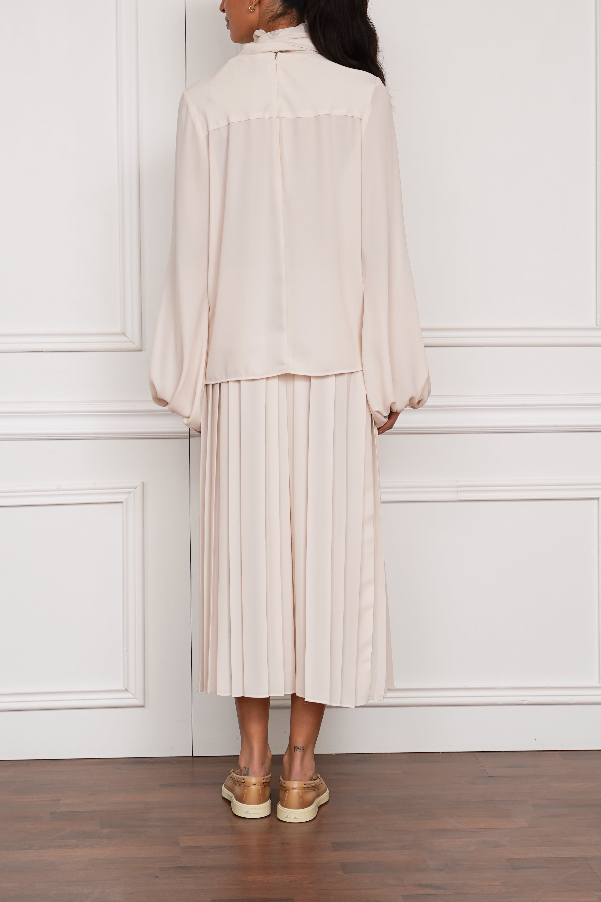 Schluppenbluse in creme