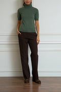 green turtleneck sweater