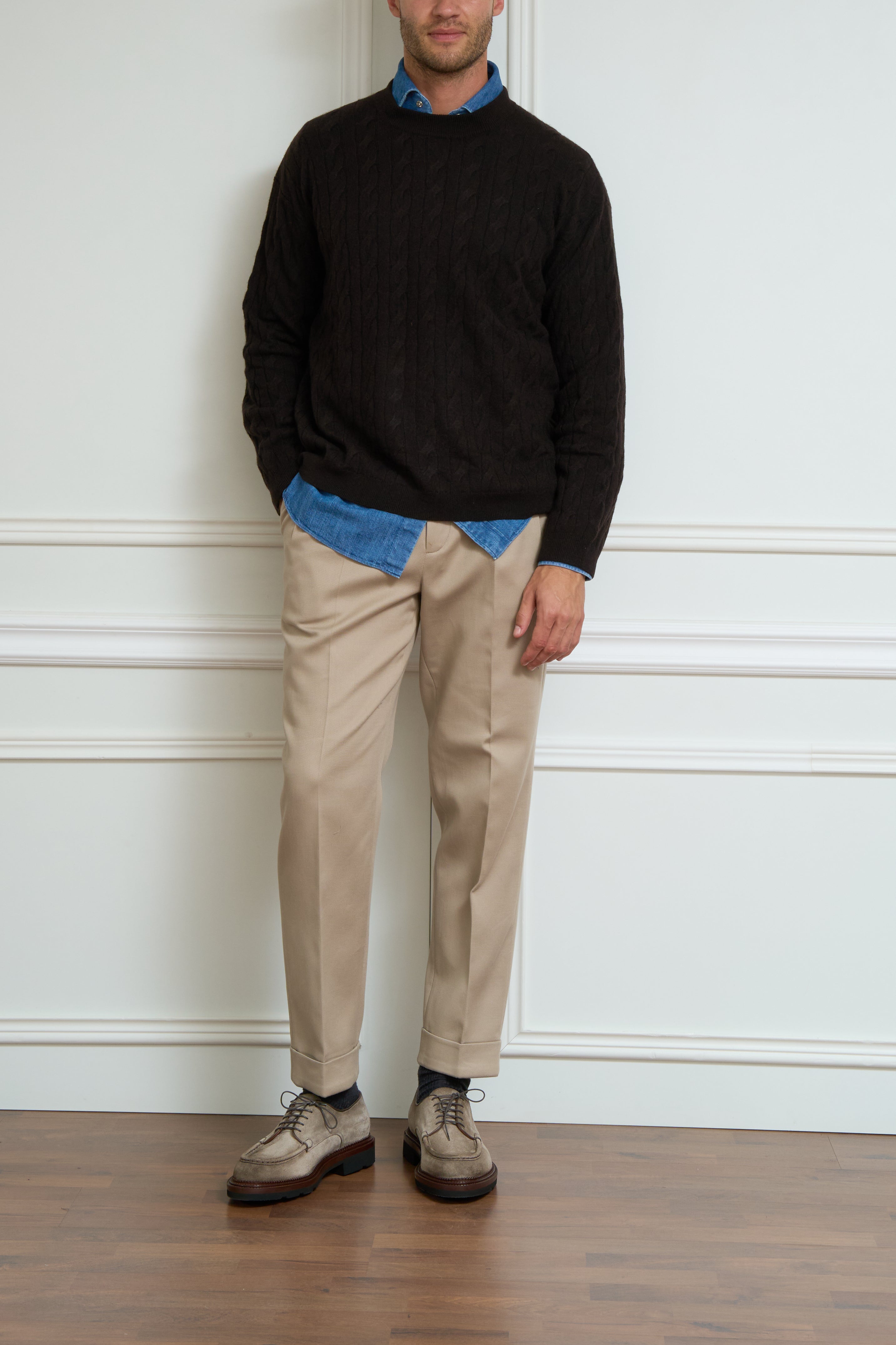Brown cable-knit sweater