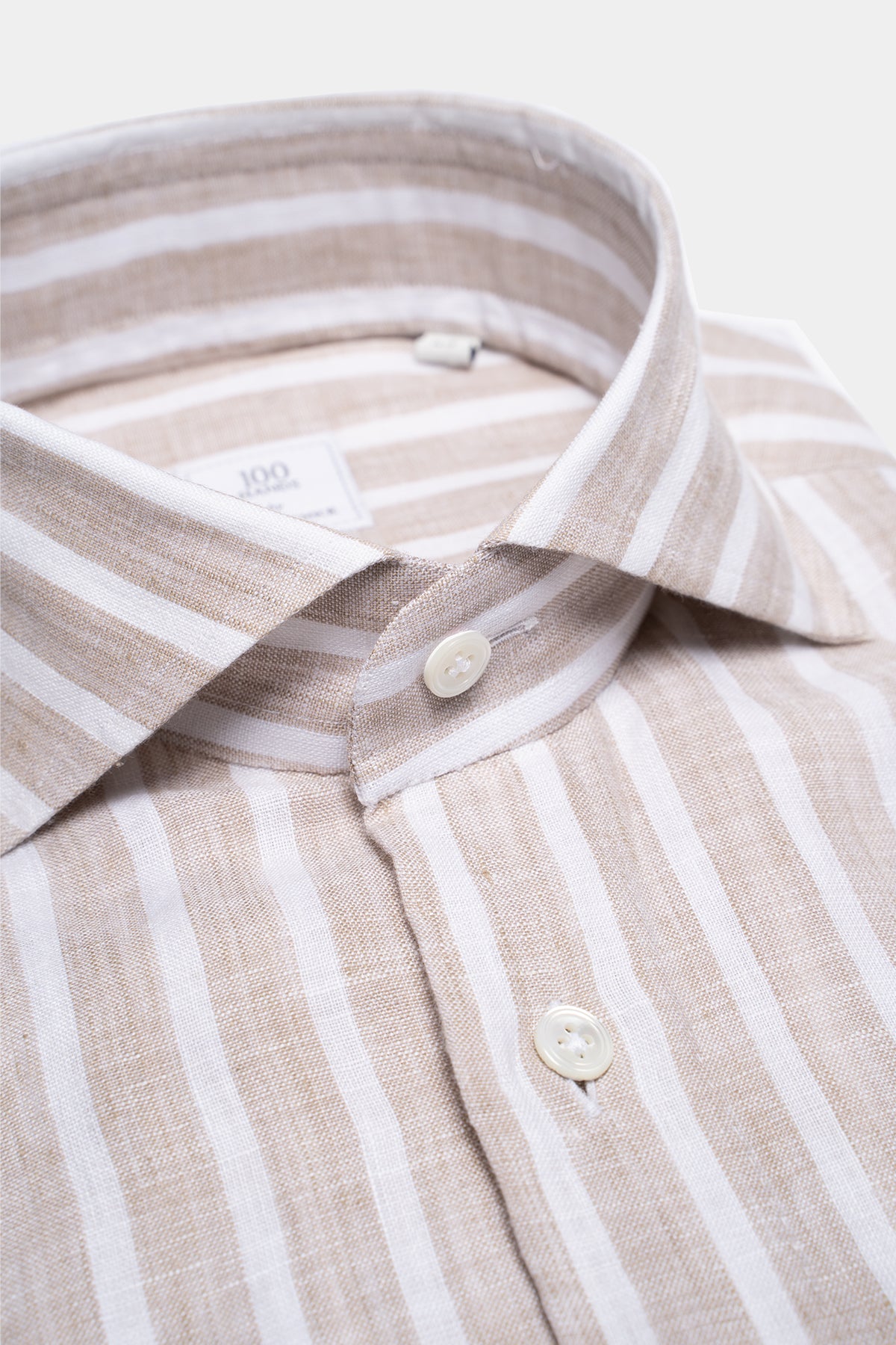 Linen shirt in beige and white stripes with shark collar
