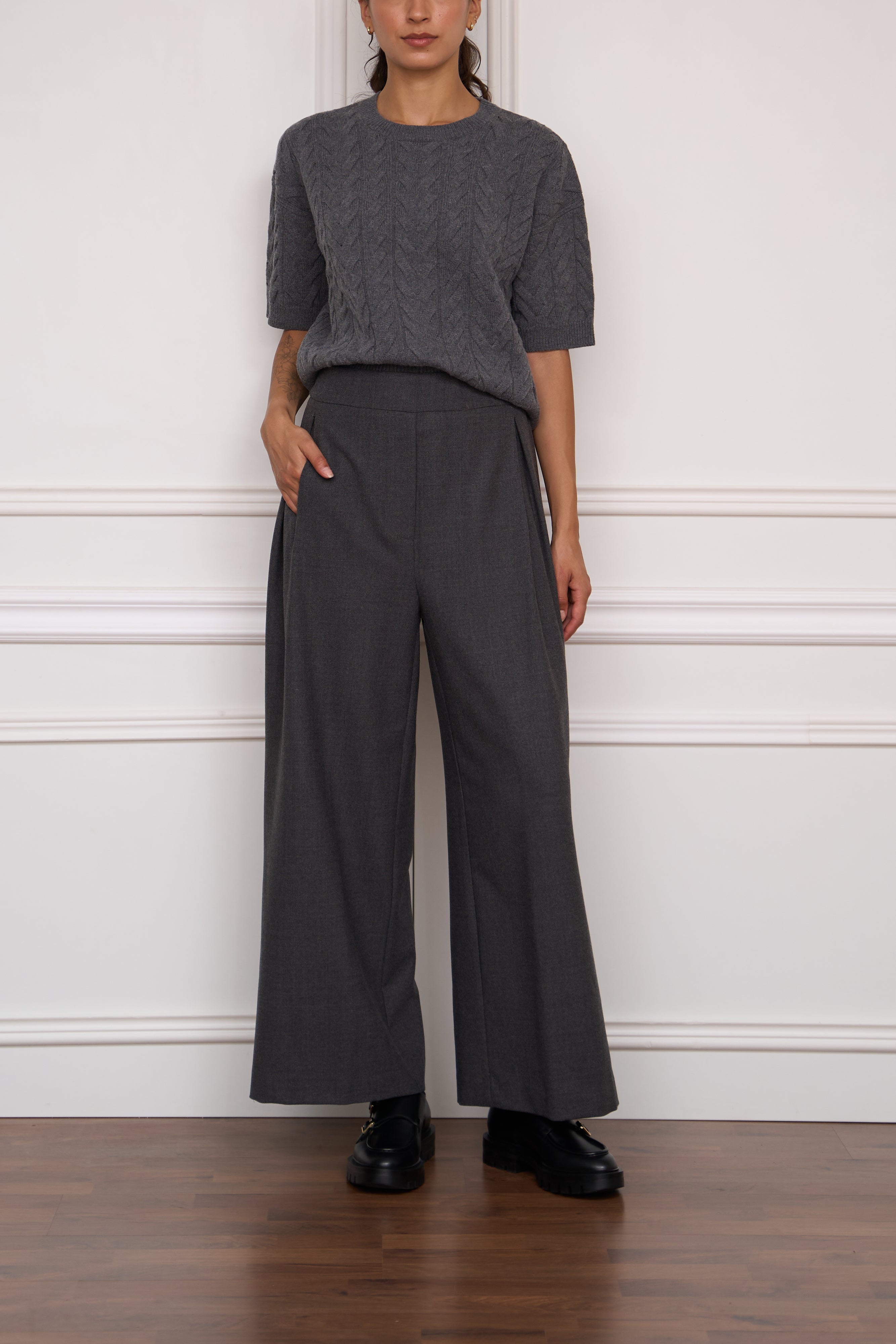 Straight trousers with button details in dark blue