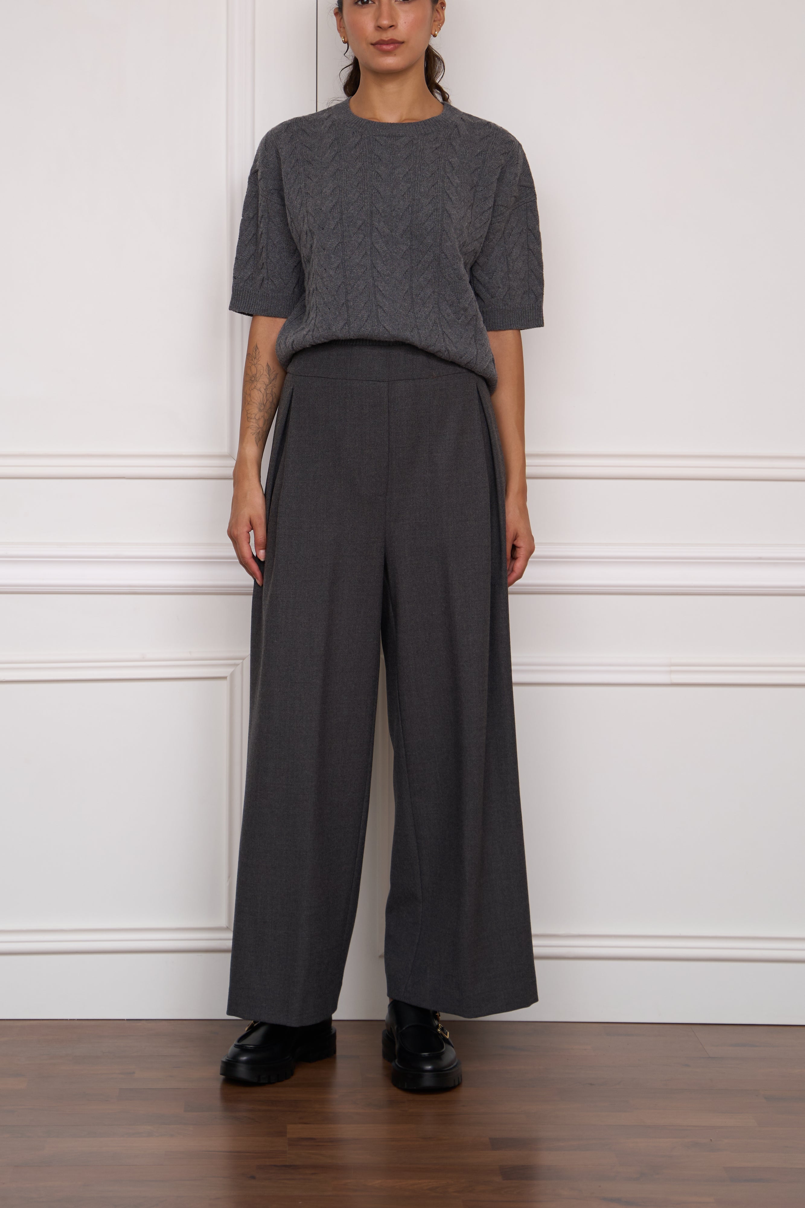 Straight trousers with button details in dark blue