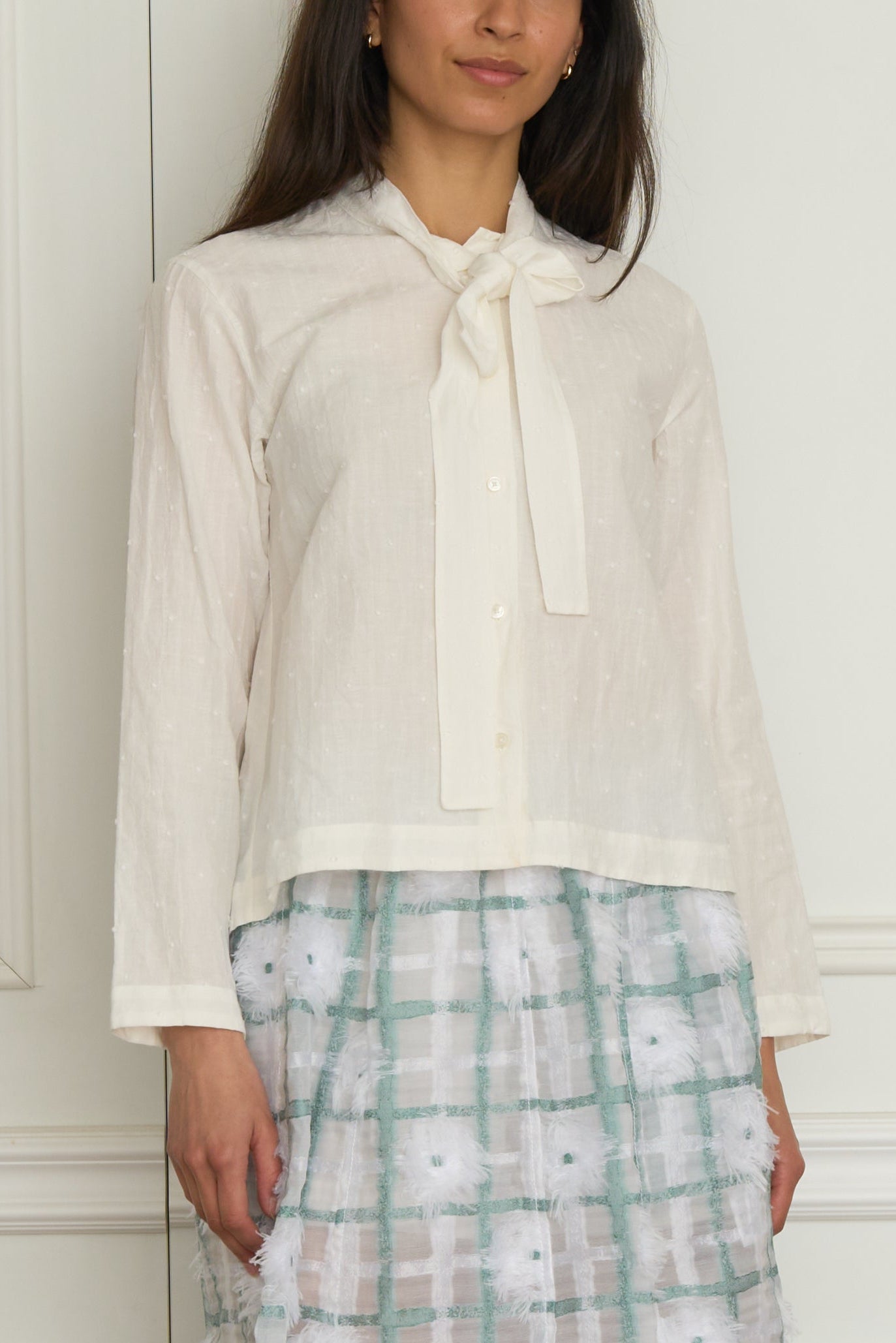 Schluppenbluse in creme