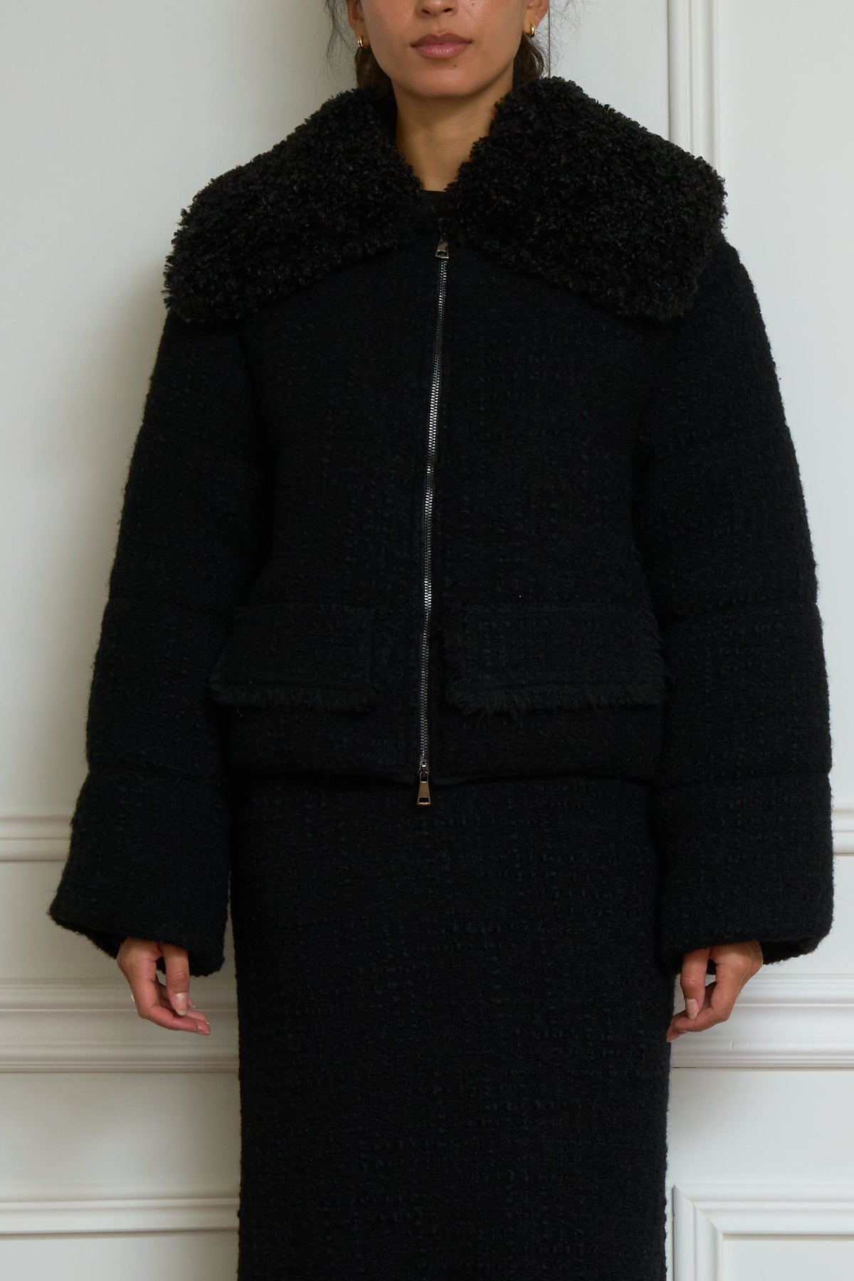 Cropped bouclé jacket with teddy collar in black