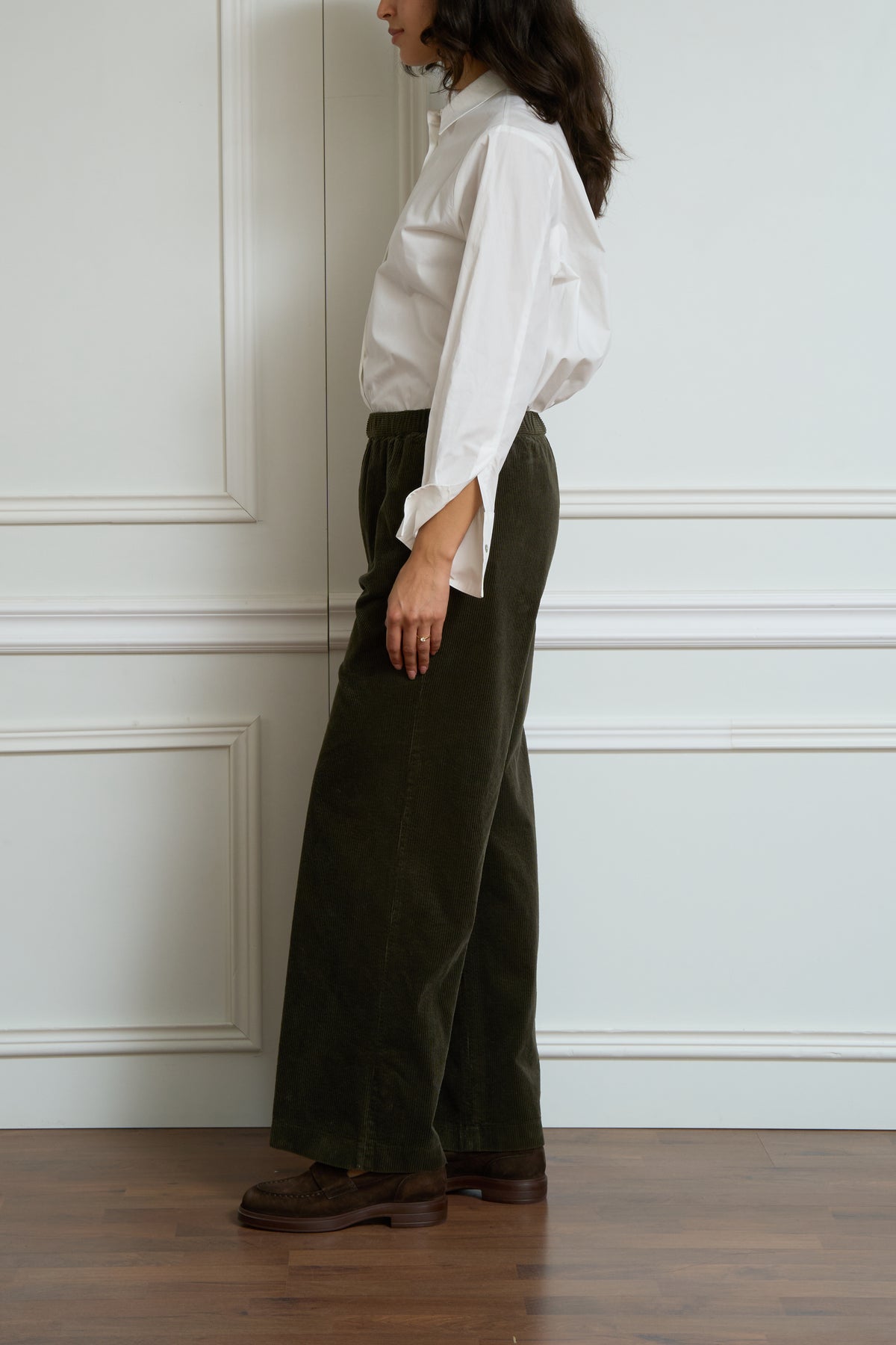 Green corduroy trousers