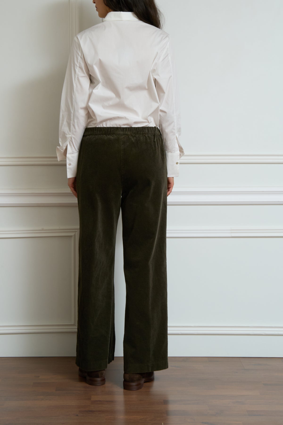 Green corduroy trousers