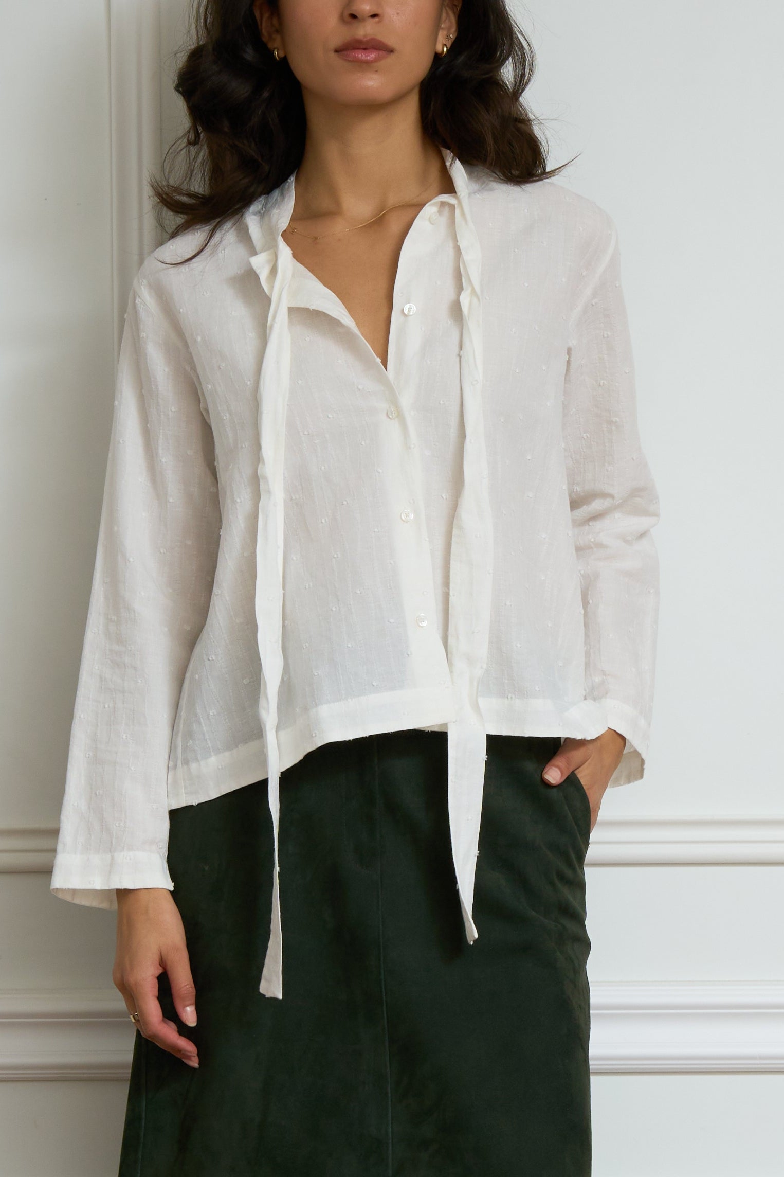 Schluppenbluse in creme