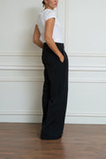 black pleated trousers