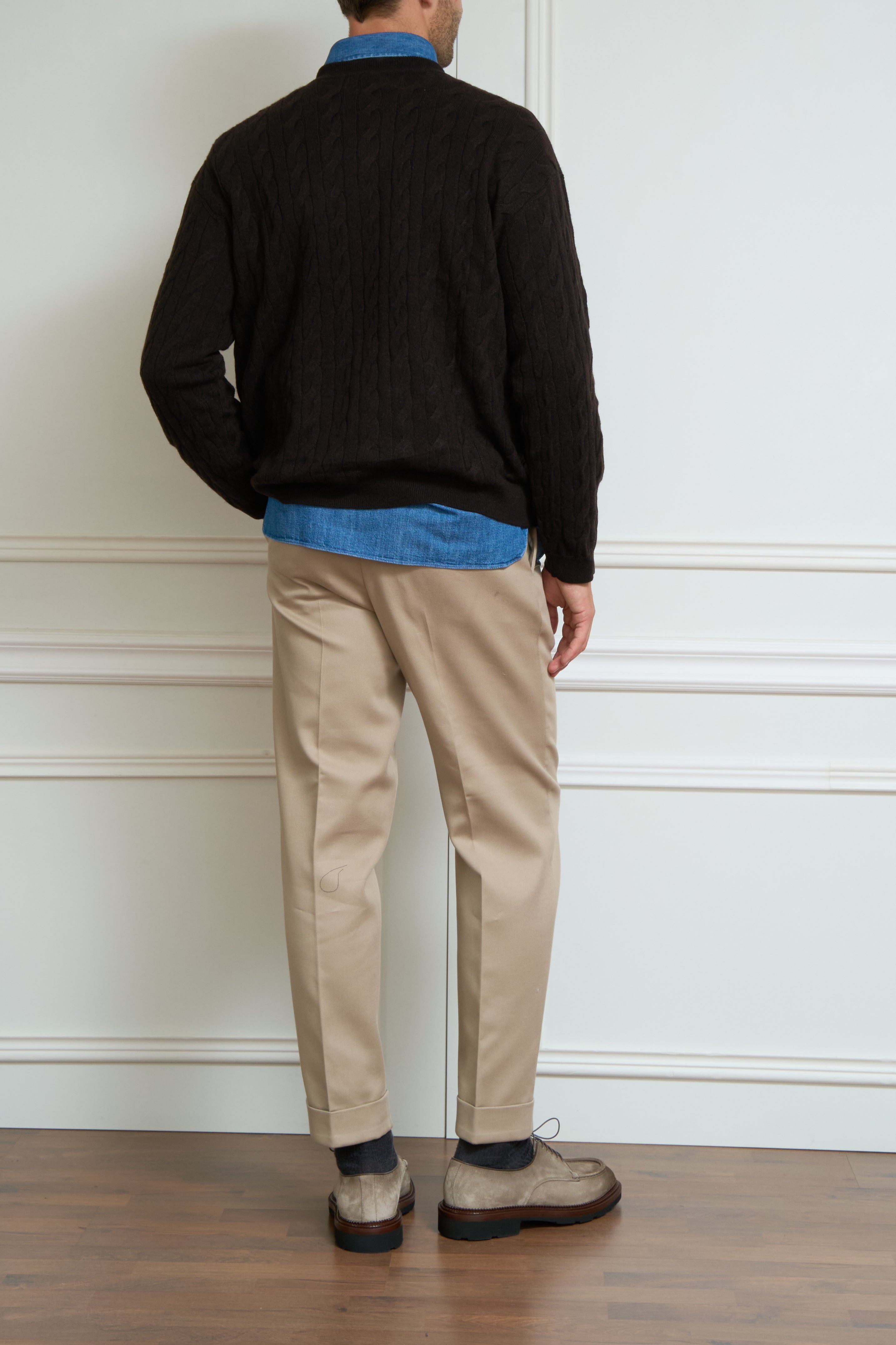 Brown cable-knit sweater