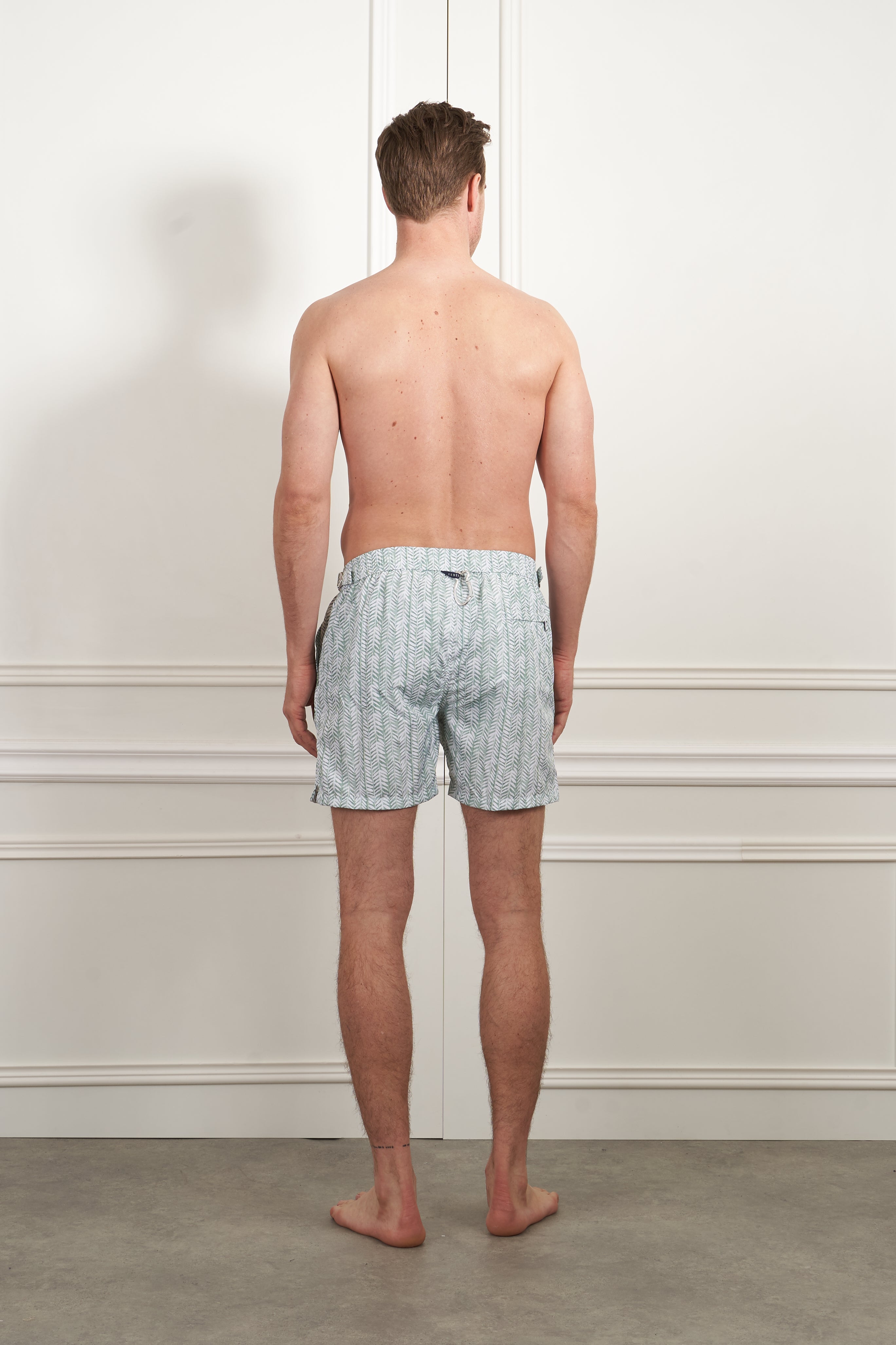 Patterned swim shorts in green